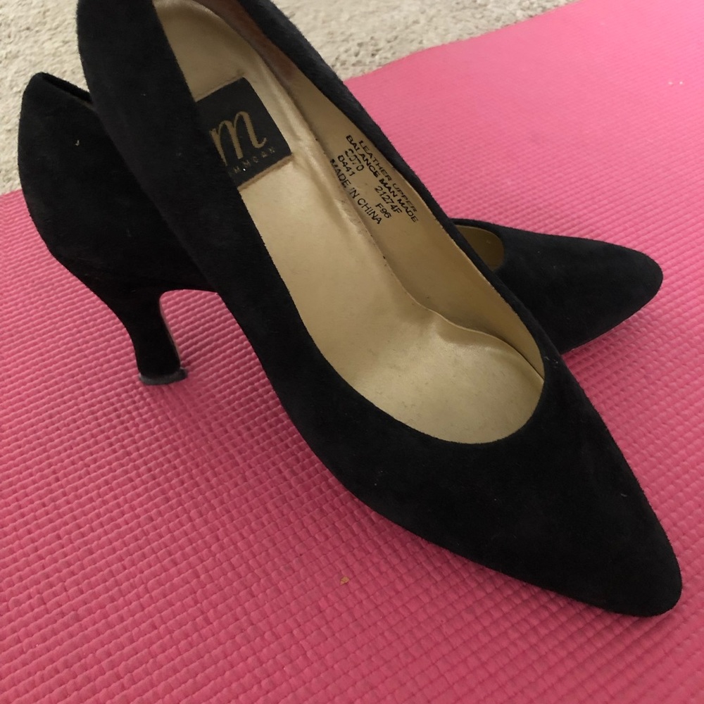 Black suede pumps.